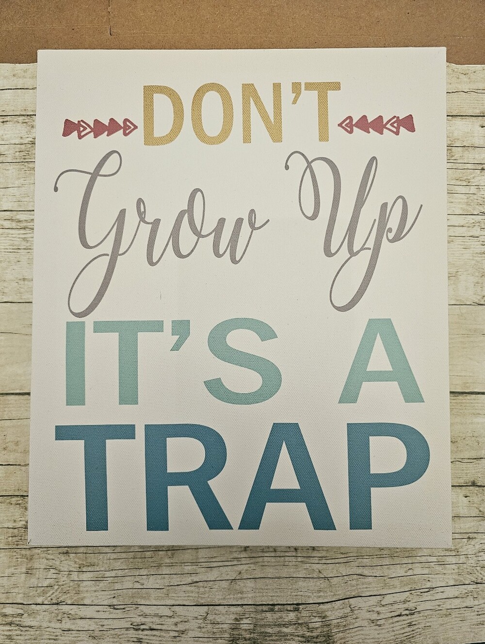 10"x 12" Don't Grow Up It's a Trap Phrase On Canvas Wall Art Hanging
